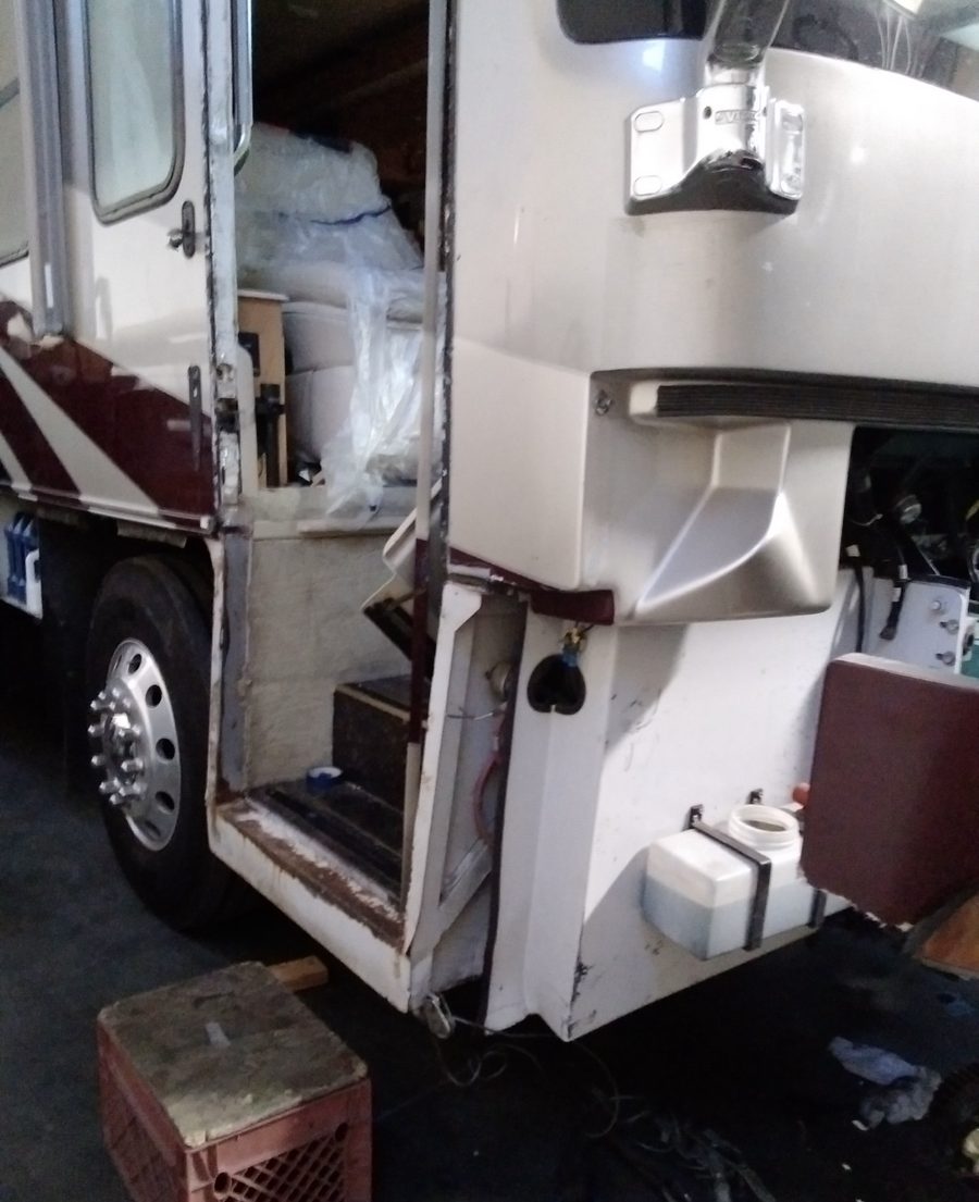 RV front cap and bumper prior to collision damage, clean finish
